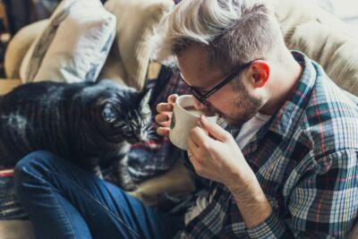 man drinking coffee during daytime